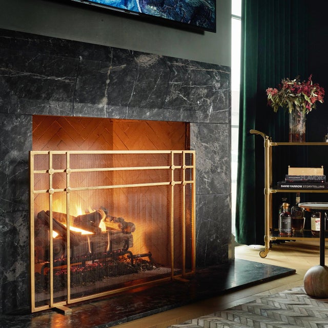 The Henry Fireplace Screen showcases a classic geometric design that is updated and modernized with gently hammered circle...