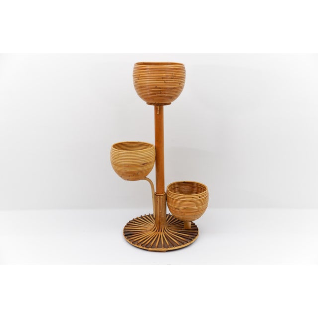 Very decorative flower stand. Light wear consistent with age and use.