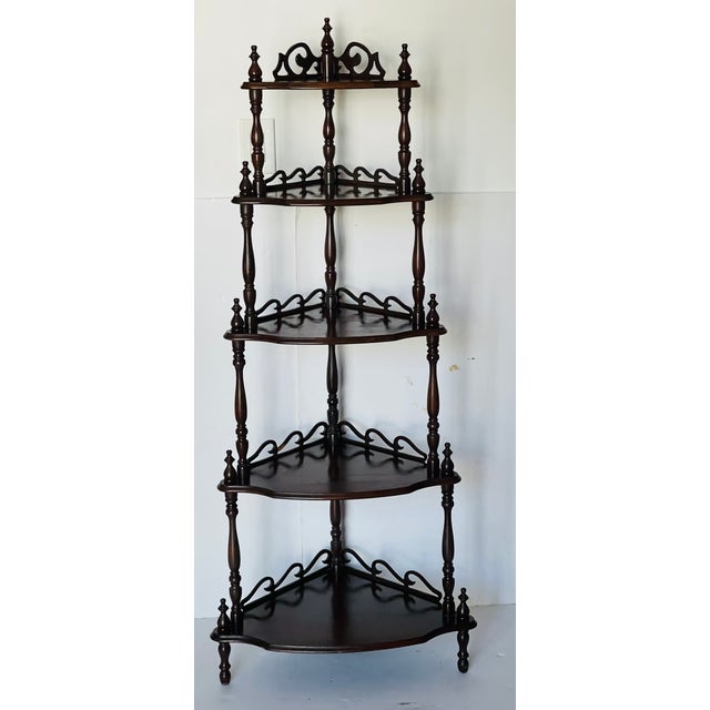 Elegant multitier corner display etagere.