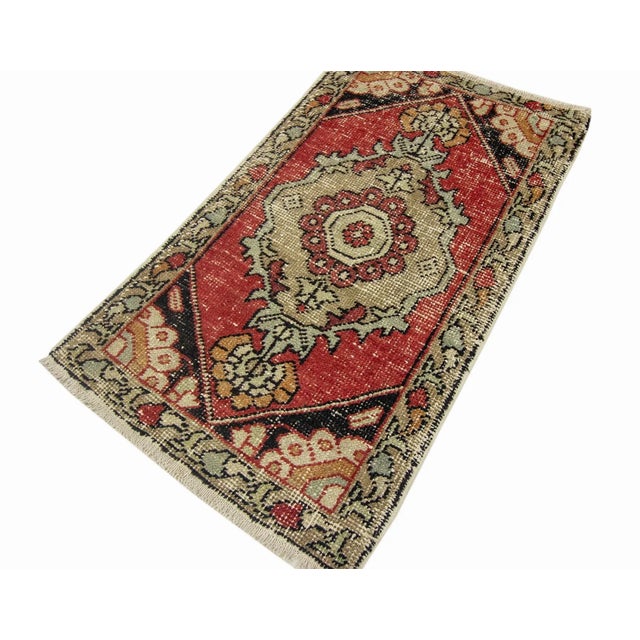 Vintage Handknotted decorative mini rug from Konya region of Turkey. Approximately 45-55 years old. In very good condition.