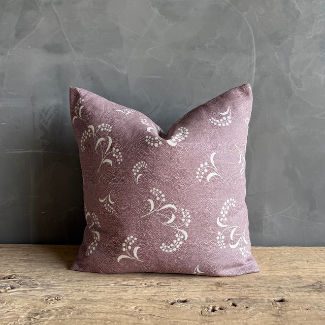 22" x 22" Made of: 100% linen Repeat: 25.25”H x 23.75"V Carolina Irving linen cushion in Mimosa Viola — a luminous, sun-...