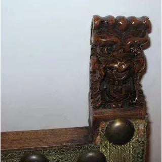 Spanish walnut carved chair with brass nail heads with dragon stretcher holding a crest. c1700 Dimensions 26 x 20 x 43