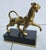 E.F Caldwell gilt bronze panther on black marble base. Gilt and marked E F Caldwell to the rim of the marble base. A...