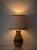 A small West German ceramic table lamp in the incised, geometric style of Aldo Londi's Bitossi pottery, worked in mustard...