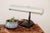 A unique desk lap done in the vintage tole style, hand painted decorations on both the top and the base. The gooseneck is...