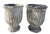 A matched pair of vintage terracotta garden planters featuring a heavily textured volcanic glaze in layered charcoal,...
