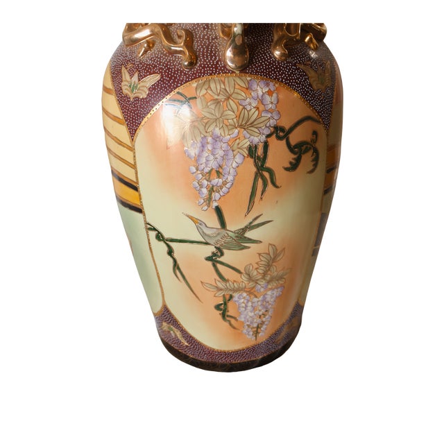 Elevate your decor with the opulent beauty of this large purple Oriental vase, adorned with exquisite gold accents. This...