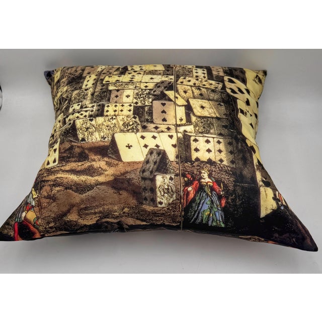 A dramatic decorative throw pillow in the style of Fornasetti, handcrafted using authentic Cole & Son silk fabric...