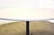 Originally designed in 1964 by Charles and Ray Eames for Herman Miller, this mid century modern round dining table has a...