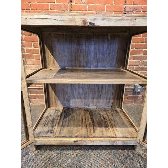 Elevate your home storage with this stunning, handcrafted solid wood display cabinet. Blending rustic farmhouse aesthetics...