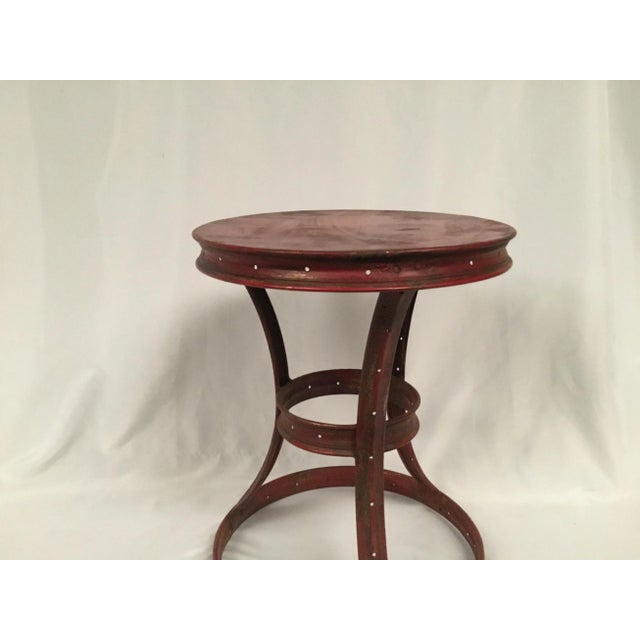 Whimsical Red Side Table- Our round accent table has tapered rings a vey simple design. Great brick red tones. Open airy...