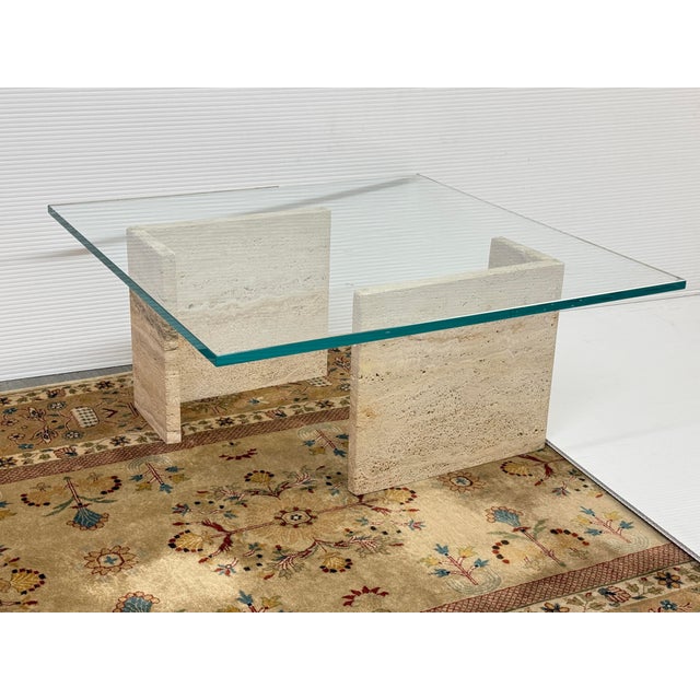 Design Plus Gallery presents a Travertine Base Coffee Table with Two Glass Table Tops. The coffee table can be assembled...