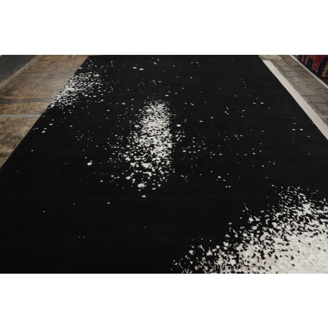 This 10×14 abstract rug is a Rug & Kilim original, made with hand-knotted wool in one of the most luxurious designs of...