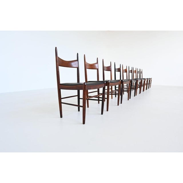 Stunning set of nine dining chairs designed by H. Vestervig Eriksen for Brdr. Tromborg, Denmark 1960. These amazingly...