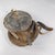 An Ethiopian leather-covered bread basket with a gorgeous patina. Baskets such as this are found among the Oromo and other...