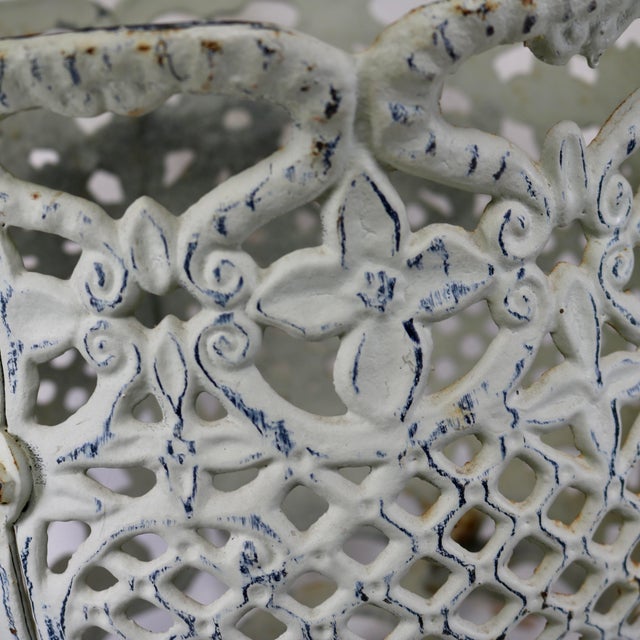 Beautiful and ornate footed cast iron planter. I love the open lace floral design as well as the heaviness of this...