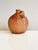 A hand-thrown, high-rise ceramic vase by Elke & Elmar Kubicek, characterized by the duo's clear, serene design language...