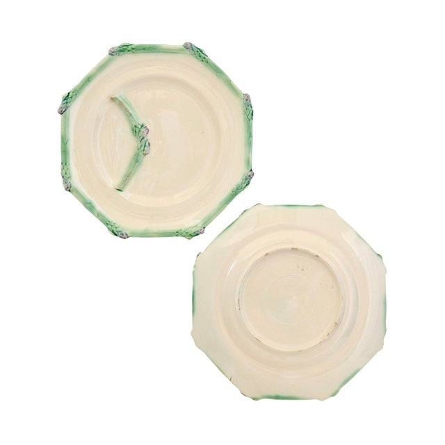 Early 20th century French asparagus serving set by Longchamps featuring four individual plates and the original draining...