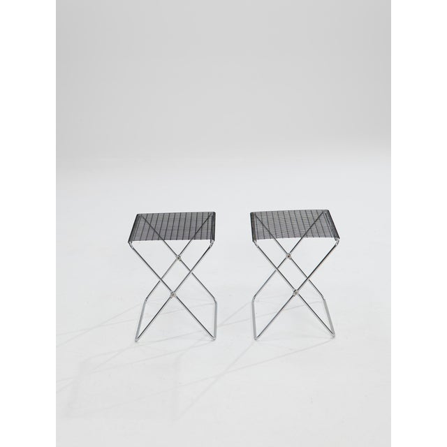 Designed by Guido De Marco and Roberto Rebolini for the Italian manufacturer Robots, these light metal stools are foldable...