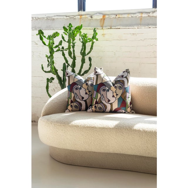 Discover a touch of artistic elegance and unparalleled comfort with this pair of down-filled throw pillows, handcrafted...