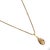 Embrace timeless elegance and good fortune with the Lucky Clover White Enamel Egg Gold Necklace. This enchanting piece...