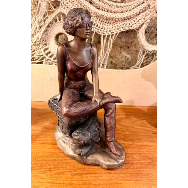 This Alice Heath sculpture is a stunning piece from her Vintage Modern Woman Collection. Created in 1992, it features a...