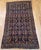 "Early 20th Century Vintage Persian Senneh Area Rug, meticulously hand-knotted circa the early 1900s. This captivating...