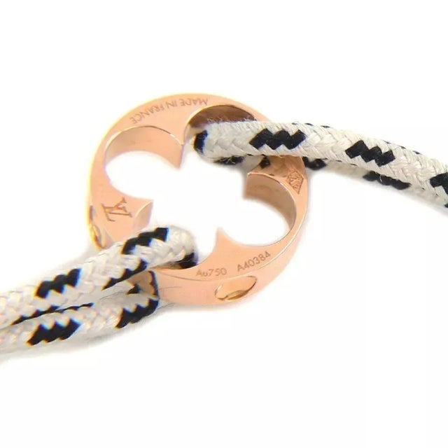 Late 20th Century Louis Vuitton France Empreinte 18k Pink Gold Charm Black & White Cord Bracelet For Sale - Image 5 of 5