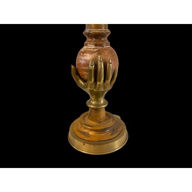 These are striking! It is a pair of neo-classical style brass and hand form table lamps. They are a cerused pine wood and...