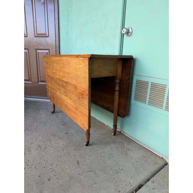 Early Early American Drop Leaf Colonial Table From 1700s or 1800s. Turned Legs and Original Wood Casters, Good as Console or Kitchen Island or Dining. For Sale - Image 4 of 8
