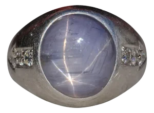 The Gooma: Art Deco Era Star Sapphire Ring with Diamonds in Platinum