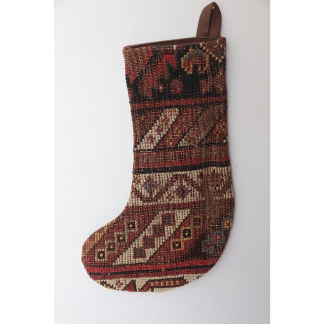 Designer Holiday Stocking Crafted from Antique RugCelebrate the season with this one-of a kind Christmas stocking,...