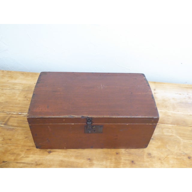 This 19th Century American painted document box is assembled with hand wrought iron nails.