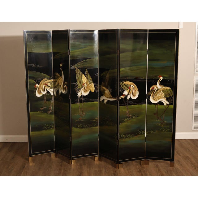 High Quality Vintage Black Lacquered Six Section Room Divider or Screen Decorated with Cranes, Ending in Brass Capped Feet
