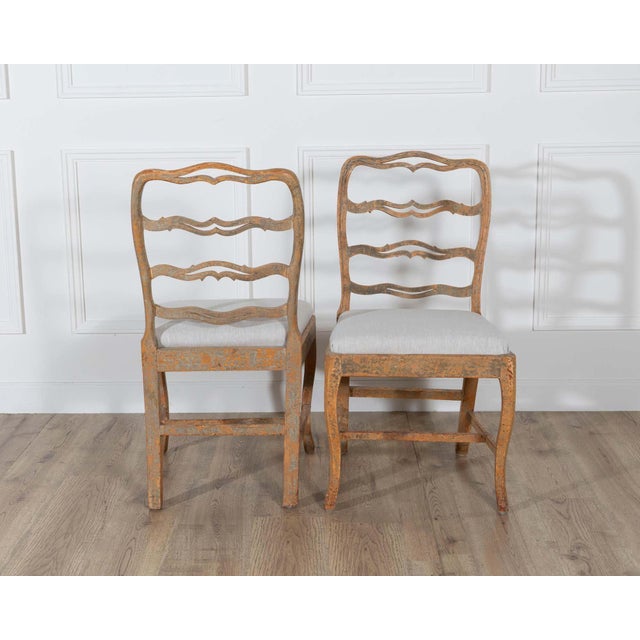 Tan A pair of slender Gustavian chairs with smiling details Circa 1780 For Sale - Image 8 of 14