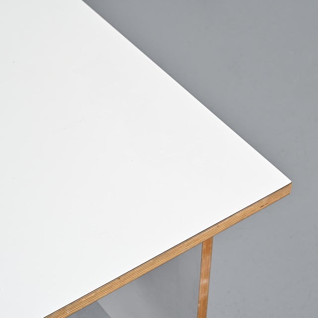 Designed by Pierre Guariche, this ingenious table can be used as either a coffee table or a desk. It consists of two...