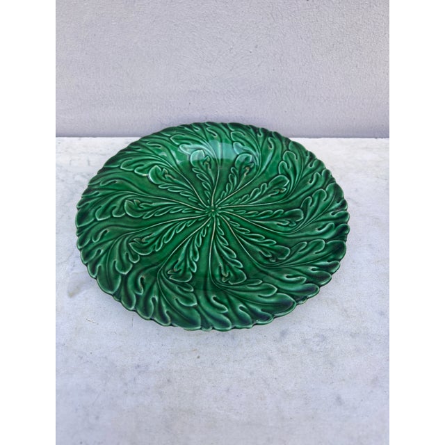 English Green Majolica Leaves Plate circa 1880. Few chips on the back.