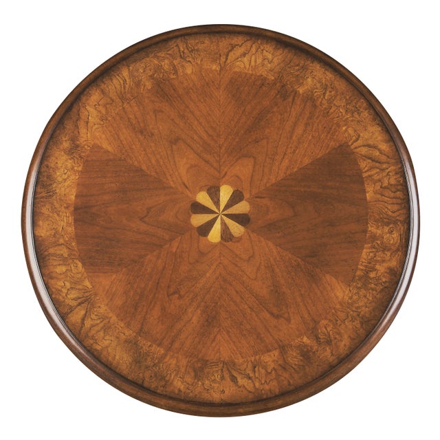 The modest proportions of this elegant accent table make ideal for use in small spaces. Crafted from select Hardwood...