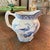 This is a vintage blue and white Earthenware creamer/milk jug in the "Yuan" pattern made by Wood & Sons (designed around...