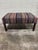 The perfect vintage kilim ottoman is here! Blue, pink and cream kilim with cream stitching. Super condition. Wood legs and...
