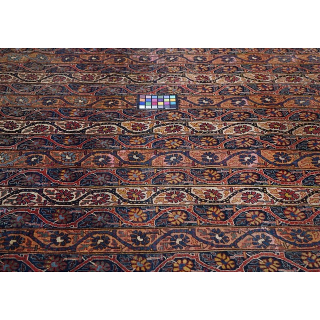 A rare format for this SW Persian nomadic tribe, this all- wool Kellegi (long carpet) show a vertical stripe (or "cane")...