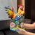 This vibrant porcelain rooster figurine brings a cheerful, decorative presence to any interior. The bird is finely modeled...