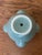 A sweet, rare #10 Mid-Century strawberry planter glazed in a distinct tone of teal with light scalloped relief decorating...