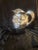 Reed and Barton silverplate Sonny Jim double face pitcher. Marked 5640 and 7HP Reed & Barton on the bottom. Discontinued...