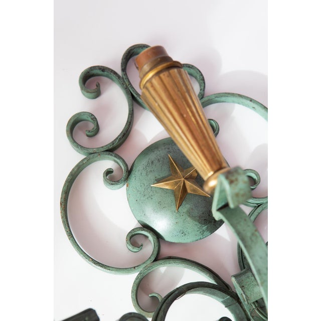 Although unsigned, this design is usually attributed to Andrés Arbus. In any case, a pair of top quality wall lights. Lamp...