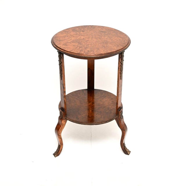 A gorgeous antique French occasional side table. It was made in France and dates from around the 1890-1900 period. It has...