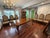Henredon Italian Baroque Carved Oak and Burl Wood Extension Dining Table. This table features a striking patchwork burl...