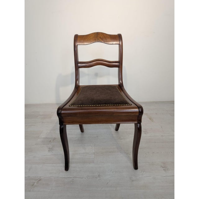 Biedermeier Walnut Wooden Chair from the 1930s/1940s This stylish Biedermeier-style armchair, dating from the 1930s/1940s,...