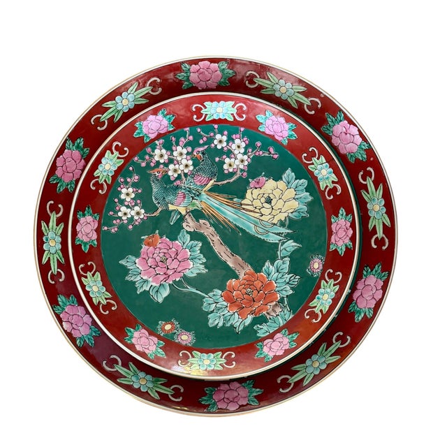 This is an incredible, highly decorative pair of vintage Japanese glazed porcelain chargers. This nesting set includes one...