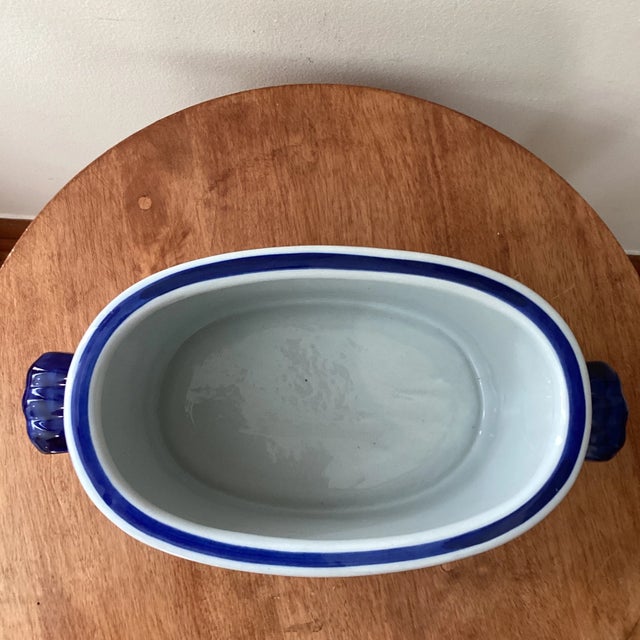 This vintage Chinoiseries handcrafted blue and white footbath planter with handles features a large ceramic piece adorned...